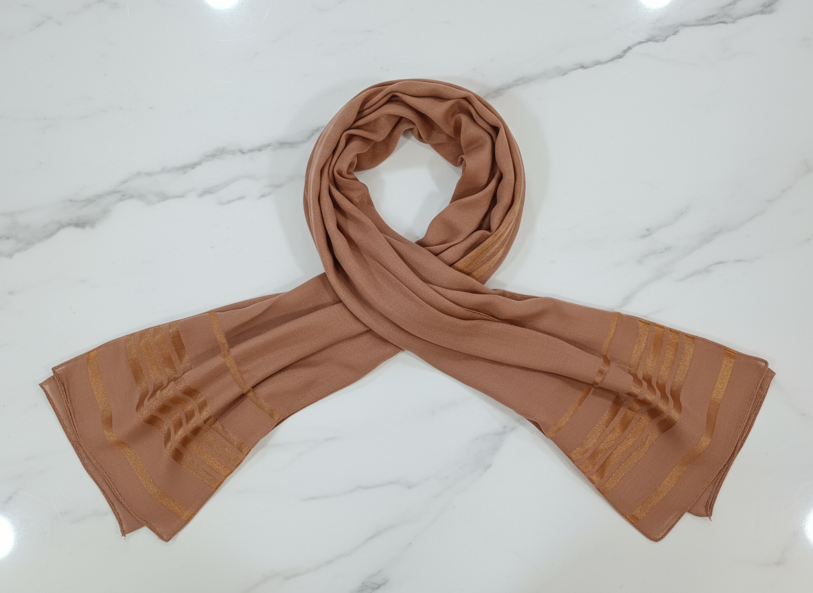 Brown scarf on a marble surface