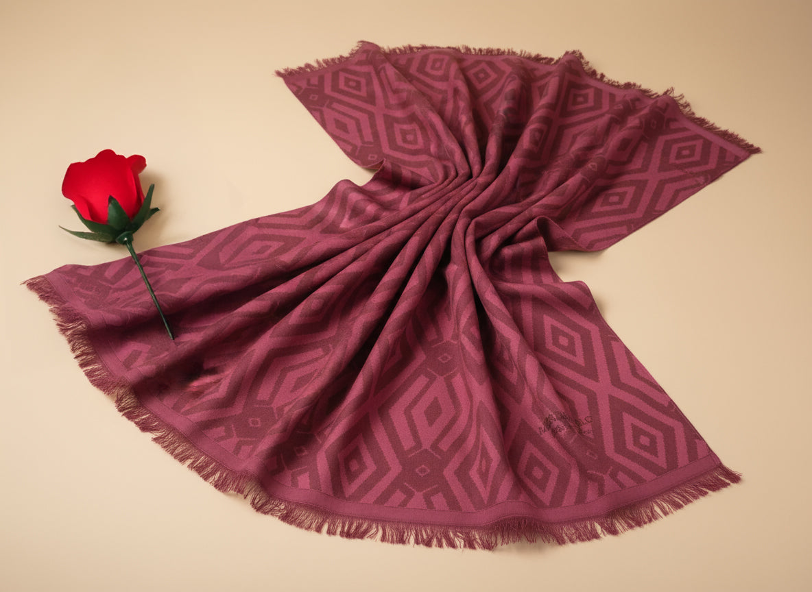 Maroon stole with  on a beige background
